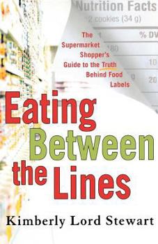Paperback Eating Between the Lines: The Supermarket Shopper's Guide to the Truth Behind Food Labels Book