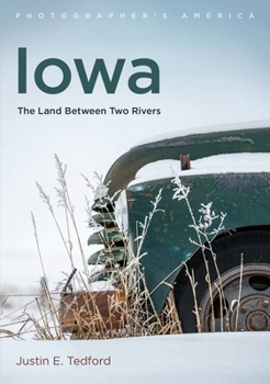 Paperback Iowa: The Land Between Two Rivers Book