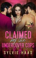 Claimed by the Undercover Cops: A Ménage Romance 1963987691 Book Cover