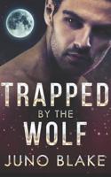 Trapped by the Wolf 1520994427 Book Cover