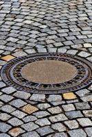 Manhole Cover on a Cobblestone Street Journal: Take Notes, Write Down Memories in this 150 Page Lined Journal 1719526648 Book Cover