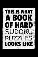 THIS IS WHAT A BOOK OF HARD SUDOKU PUZZLES LOOKS LIKE: A book of 300 HARD SUDOKU Puzzles 1672546818 Book Cover