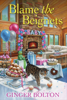 Blame the Beignets (A Deputy Donut Mystery) 1496749618 Book Cover