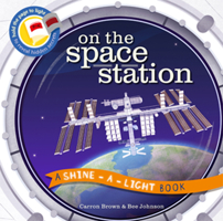 On the Space Station: A Shine-a-Light Book 1610674111 Book Cover
