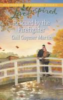 Rescued by the Firefighter 0373817584 Book Cover