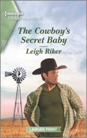 The Cowboy's Secret Baby 1335889787 Book Cover