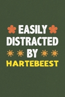 Easily Distracted By Hartebeest: Hartebeest Lovers Funny Gifts Dot Grid Journal Notebook 6x9 120 Pages 167975971X Book Cover