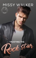 Trusting a Rockstar: A rockstar workplace romance 192303605X Book Cover