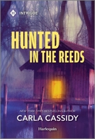 Hunted in the Reeds 1335081968 Book Cover