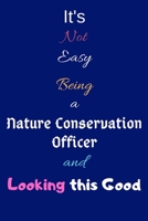 It's Not Easy Being a Nature Conservation Officer and Looking This Good: Blank-Lined Journal/Notebook/Diary for Nature Conservation Officers - Cool Birthday Present & Nature Conservation Gift 1676379649 Book Cover