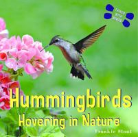 Hummingbirds: Hovering in Nature (Things With Wings) 1404244948 Book Cover