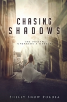 Chasing Shadows: The Present Unearths A Mystery 1640852298 Book Cover