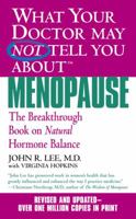 What Your Doctor May Not Tell You About Menopause: The Breakthrough Book on Natural Hormone Balance 0446691429 Book Cover