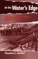 At the Water's Edge : Defending Against the Modern Amphibious Assault 1591143225 Book Cover