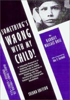 Something's Wrong with My Child: A Valuable Resource in Helping Parents and Professionals to Better Understand Themselves in Dealing with the Emotionally Charged Subject of Children with Disabilities 0398053251 Book Cover