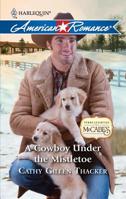 A Cowboy Under the Mistletoe 0373753381 Book Cover