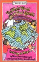 The Whole World in Your Hands: Looking at Maps (Discovery Readers) 0824986091 Book Cover