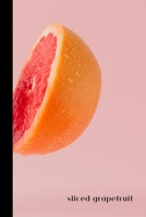 sliced grapefruit: small lined Grapefruit Notebook / Travel Journal to write in (6'' x 9'') 120 pages 1693576635 Book Cover