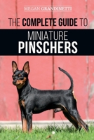 The Complete Guide to Miniature Pinschers: Training, Feeding, Socializing, Caring for and Loving Your New Min Pin Puppy 1952069998 Book Cover