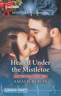 Healed Under the Mistletoe 1335663932 Book Cover