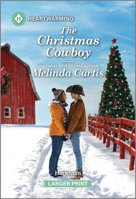 The Christmas Cowboy: A Clean and Uplifting Romance 1335460233 Book Cover