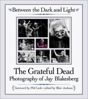Between the Dark and Light: The Grateful Dead Photography of Jay Blakesberg 0879308141 Book Cover