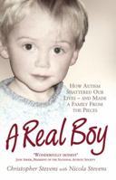 A Real Boy: How Autism Shattered Our Lives - and Made a Family from the Pieces 1843172666 Book Cover