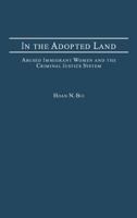 In the Adopted Land: Abused Immigrant Women and the Criminal Justice System (Criminal Justice, Delinquency, and Corrections) 0275977080 Book Cover