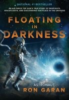 Floating in Darkness: An Air Force Top Gun's True Story of Dogfights, Spaceflights, and Discovering Our Place in the Universe 1732451141 Book Cover