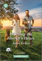 Winning the Sheriff's Heart 133505118X Book Cover