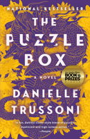 The Puzzle Box: A Novel 0593595343 Book Cover