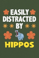 Easily Distracted By Hippos: A Nice Gift Idea For Hippo Lovers Boy Girl Funny Birthday Gifts Journal Lined Notebook 6x9 120 Pages 1710178094 Book Cover