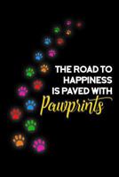 The Road to Happiness Is Paved with Pawprints 1799224791 Book Cover