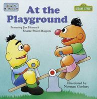 At the Playground (Toddler Board Book: Sesame Street) 0679888853 Book Cover