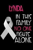 LYNDA In This Family No One Fights Alone: Personalized Name Notebook/Journal Gift For Women Fighting Lung Cancer. Cancer Survivor / Fighter Gift for the Warrior in your life Writing Poetry, Diary, Gra 1702428893 Book Cover