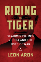 Riding the Tiger: Vladimir Putin's Russia and Uses of War 0844750557 Book Cover