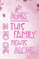 AGNES In This Family No One Fights Alone: Personalized Name Notebook/Journal Gift For Women Fighting Health Issues. Illness Survivor / Fighter Gift for the Warrior in your life Writing Poetry, Diary,  1704406919 Book Cover