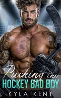 Pucking the Hockey Bad Boy: An Enemies-to-Lovers Single Dad Romance 099988445X Book Cover