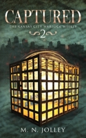 Captured: Book Two of the Kansas City Warlock Weekly 1304794008 Book Cover