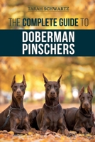 The Complete Guide to Doberman Pinschers : Preparing for, Raising, Training, Feeding, Socializing, and Loving Your New Doberman Puppy 1952069874 Book Cover