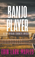 The Banjo Player: A cozy crafts & hobbies mystery (The Sheridan County Mysteries) 1959116061 Book Cover