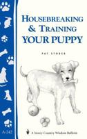 Housebreaking and Training Your Puppy (Storey Country Wisdom Bulletin, a-242) 1580172989 Book Cover