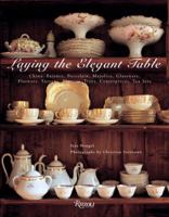 Laying the Elegant Table: China, Faience, Porcelain, Majolica, Glassware, Flatware, Tureens, Platters, Trays, Centerpieces, Tea Sets 0847828441 Book Cover