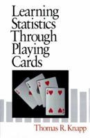 Learning Statistics through Playing Cards 0761901094 Book Cover