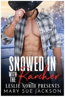 Snowed in with the Rancher 1739958225 Book Cover