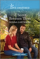 A Secret Between Them: An Uplifting Inspirational Romance 1335598790 Book Cover