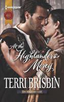 At the Highlander's Mercy 0263898202 Book Cover