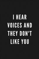 I Hear Voices And They Don't Like You: Funny Gift for Coworkers & Friends | Blank Work Journal to write in with Sarcastic Office Humour Quote for ... Secret Santa, Birthday, Retirement or Leaving 1677476001 Book Cover