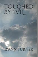 TOUCHED BY EVIL 1728628016 Book Cover