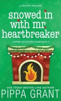 Snowed in with Mr. Heartbreaker 1955930309 Book Cover
